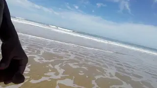 Naturist Couple Pee Together on a Public Beach