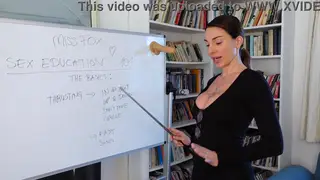 Busty MILF Teacher Seduces Student into Lesbian Desk Encounter