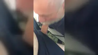 Mature Daddy Receives Blowjob Outdoors from Man