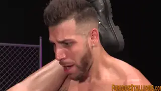 Muscular Stud Takes Two Cocks in Rough Threeway
