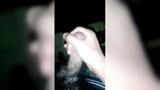 Guy in AC Jacket Strokes Solo on Camera