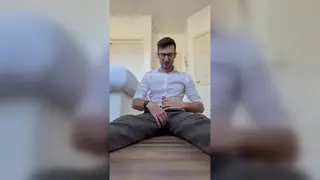 Tattooed Doctor Strokes His Uncut Cock on Camera