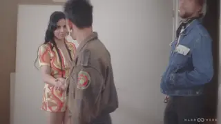 Busty Hairy Brunette Takes On a Rough Office Gangbang