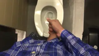 Muscular Guy Jerks His Uncut Cock at Work