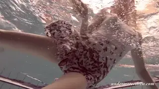 Blonde European Shows Curves Underwater