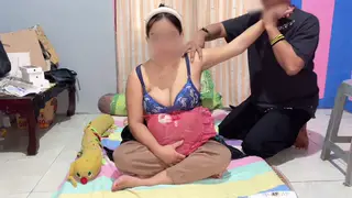 Busty Asian Wife Delivers Massage and Titjob