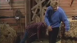 Blonde Farmhand Works a Handjob in the Open Air