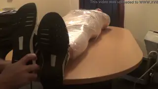 Bound Latino Endures Relentless Foot Tickling