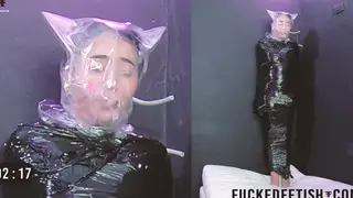 Brunette Sub Endures Mummification and Breath Play at Work