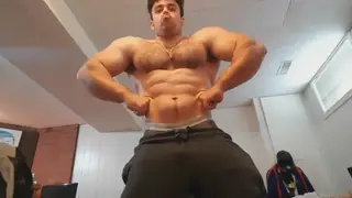 Hairy Latino Bear Flexes Muscular Physique for Camera