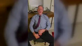 Mature European Coach Strokes Uncut Cock at Desk