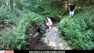 Mature Men Double-Penetrate a Twink in a Bareback Threesome