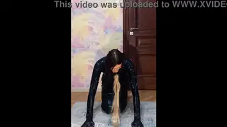 Slender Crossdresser Poses in Heels While Wearing Butt Plugs