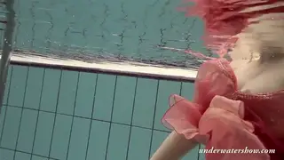 Blonde Teen Bares All During Poolside Swim
