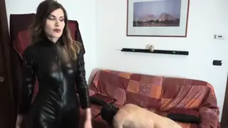 Curvy Femdom Pegs Bound Sub in Leather Gear