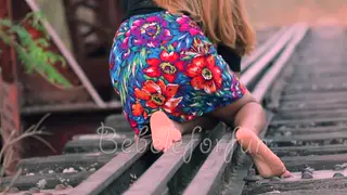 Busty Lesbian Struts and Shows Off Her Curves