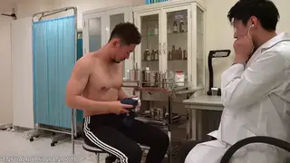 Japanese Doctor Examines a Muscular Student in the Classroom