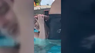Woman Gives Poolside Blowjob Under Open Sky
