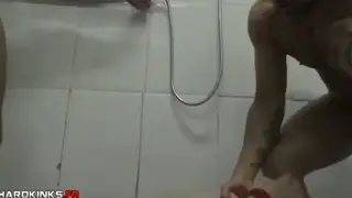 Muscle Studs Dominate a Sub in a Wet Shower Threesome