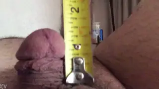 Slim Femboy Measures His Tiny Bulge for the Camera