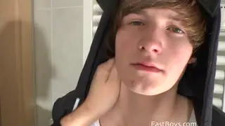 Uncut Twink Endures Fisting and Handjob in Bathroom