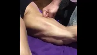 Ripped Female Bodybuilder Flexes Hard Muscle in Gym