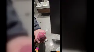 Mature Daddy Unloads Massive Cumshot in Airport Bathroom