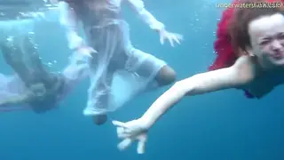 Blonde Lesbians Explore Each Other Underwater