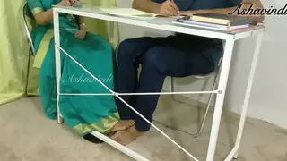 Indian Teacher Commands a Footjob at Her Desk