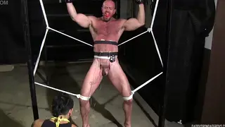 Muscular Cop Endures Electro Bondage from Dom
