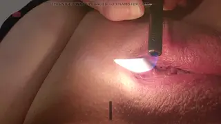 Mature BBW Teases Clit with Flame in Close-Up