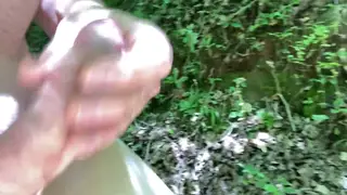 Uncut Guy Strokes Outdoors Until Cumshot