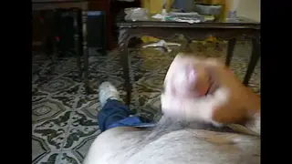 Slim Guy Jerks Off on the Couch Until He Cums