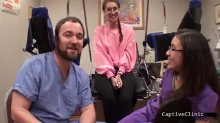 Brunette Bound in Latex Endures Wand Vibrations in Hospital
