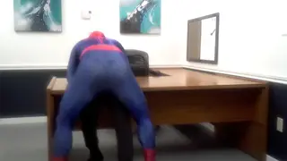 Spandex Hero Humps Captured Robber at Desk