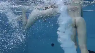European Teens Share Intimate Poolside Lesbian Moment
