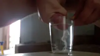 Solo Guy Strokes Until He Shoots Into a Glass