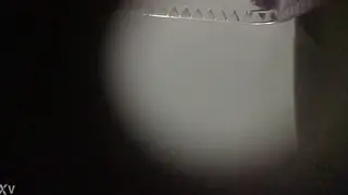 Guy Pisses in a Public Restroom Stall