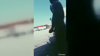 Muscular Black Hunk Strokes Outdoors at a Truck Stop
