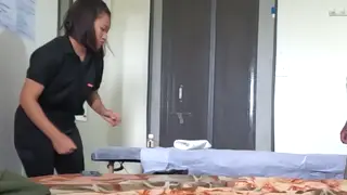 Asian Masseuse Delivers a Relaxing Massage Session