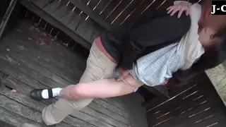 Asian Babe Rides Outdoors in Daring Public Play