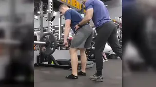 Latino Coach Bends a Student Over the Desk
