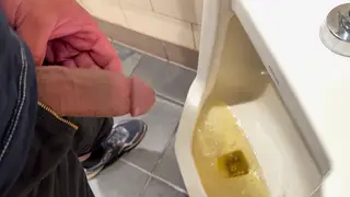 Hairy Mature Bear Pisses at a Public Urinal
