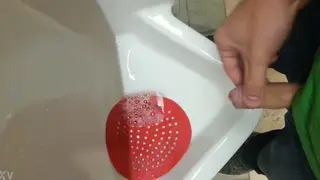 Uncut Guy Pisses Outdoors Then Strokes His Cock