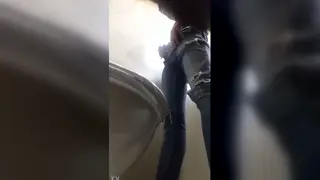 Three Men Share a Quick Bathroom Encounter