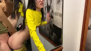 Brunette Takes Public Blowjob Risk in Store Fitting Room