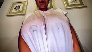 Voluptuous Mature Woman Shows Off Her Heavy Breasts