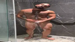 Tattooed Latino Bear Jerks Off in Hotel Bathroom