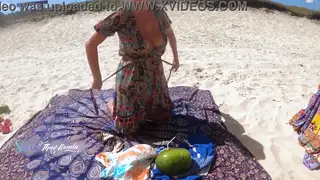 Busty Latina Wife Teases Beach Vendor While Husband Watches