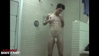 Muscular Twink Strokes to Cumshot and Pisses in Bathroom